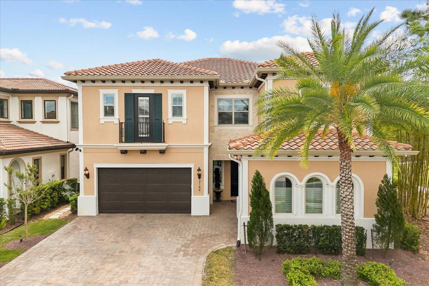 Welcome to 3144 Players View Circle, a stunning executive home in the exclusive guard gated community of Reserve at Alaqua. This elegant Fitzgerald model features 5 bedrooms, 5.5 bathrooms and around 4,000 sq ft of luxury living, including an oversized driveway and a 3-car garage equipped with an EV charger. Step inside to engineered hardwood floors and a bright, open layout filled with upscale finishes. The gourmet kitchen is a chef’s dream, with light cabinetry, stone countertops, a natural gas cooktop and a farmhouse sink. A massive walk-in pantry and butler’s pantry make entertaining effortless.A temperature-controlled wine room adds a refined touch, holding over 200 bottles. Enjoy meals in the formal dining area or relax in the spacious family room. A private office with built-ins provides the ideal work-from-home space. The first floor also includes a guest suite with its own en suite bath and the 2nd floor, a second family room with a wet bar expands the living space. Three additional bedrooms each have private bathrooms. The luxurious primary suite features a spa-like en suite with garden tub, walk-in shower, and two custom closets. Step outside to your personal oasis with a saltwater, gas-heated pool and spa. An outdoor kitchen and covered patio create the perfect entertaining space. The landscaped backyard offers both privacy and beauty. This home sits next to a peaceful park and is close to the driving range and clubhouse. Enjoy access to a Gary Player-designed golf course and 24/7 guard-gated security. Located near top-rated schools including Heathrow Elementary and Lake Mary High. This home blends luxury, comfort, and lifestyle—don’t miss your chance to make it yours.