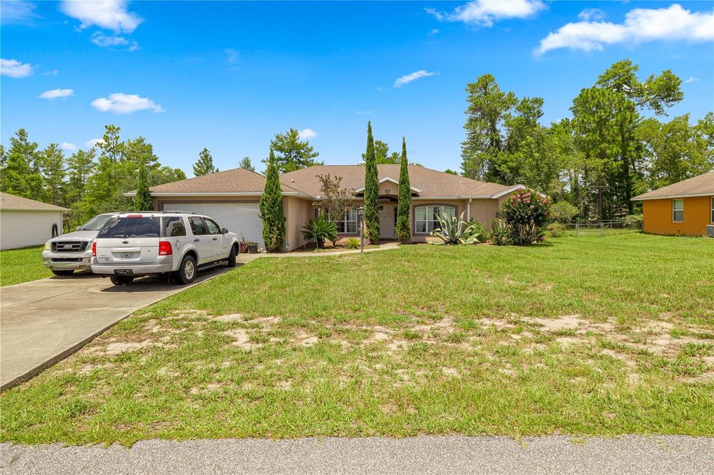 Photo of 4949 SW 109th Loop, Ocala, FL 34476 (MLS # OM707005)