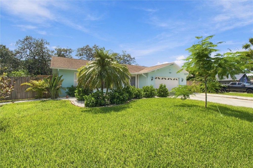 Photo of 1507 Poinsettia Avenue, Tarpon Springs, FL 34689 (MLS # W7889510)