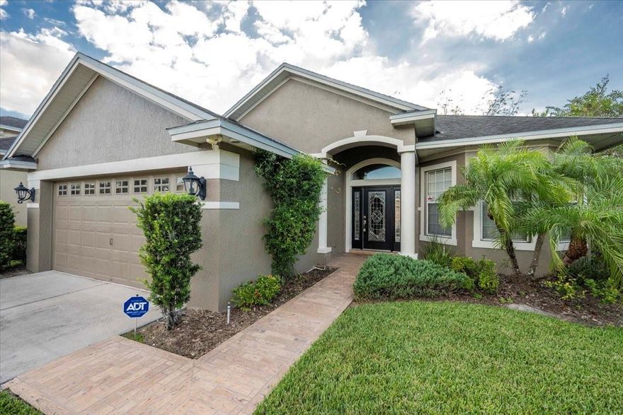 Welcome to 6103 Stoney Creek Way! This 3-bedroom, 2-bath home with an additional office (complete with closet, perfect for a guest room or flex space) offers nearly 2,200 square feet of comfortable living in a desirable gated community.



Built in 2007, this home features an inviting open layout with high ceilings, elegant trim work, and a blend of wood flooring, tile, and brand-new carpet in the bedrooms. Enjoy a spacious kitchen with granite countertops, stainless steel appliances, a large pantry, and a cozy dining area. A separate formal dining room is ideal for entertaining.



The generous primary suite includes a walk-in closet and a luxurious en suite bath with double vanities, a jetted tub, and a separate shower. The interior laundry room adds everyday convenience.



Step outside to the screened back porch overlooking beautifully landscaped grounds—a peaceful space to relax or entertain year-round.



Situated on a corner lot in a well-maintained, gated neighborhood, residents also enjoy access to a community pool and clubhouse. HOA fees cover lawn care & scheduled exterior repainting providing low-maintenance living and peace of mind.



With a freshly painted interior and Brand New AC, this lovely home is move-in ready and filled with thoughtful details. This home perfectly blends comfort, quality, and value in one of South Lakeland’s most desirable communities.