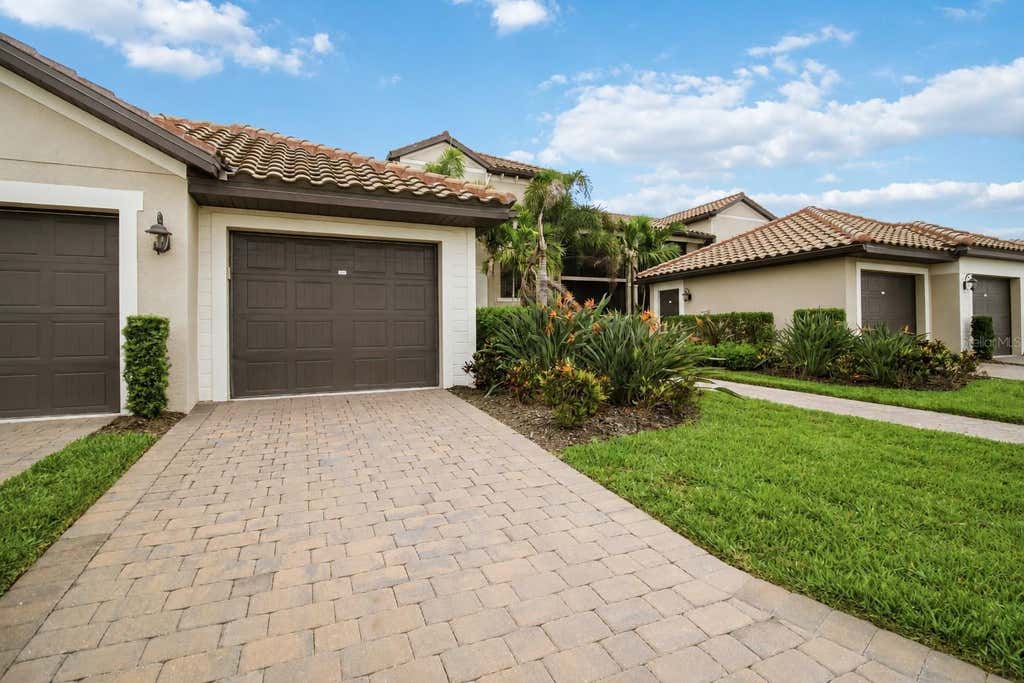 Photo of 5695 Palmer Circle #203, Bradenton, FL 34211 (MLS # A4696270)