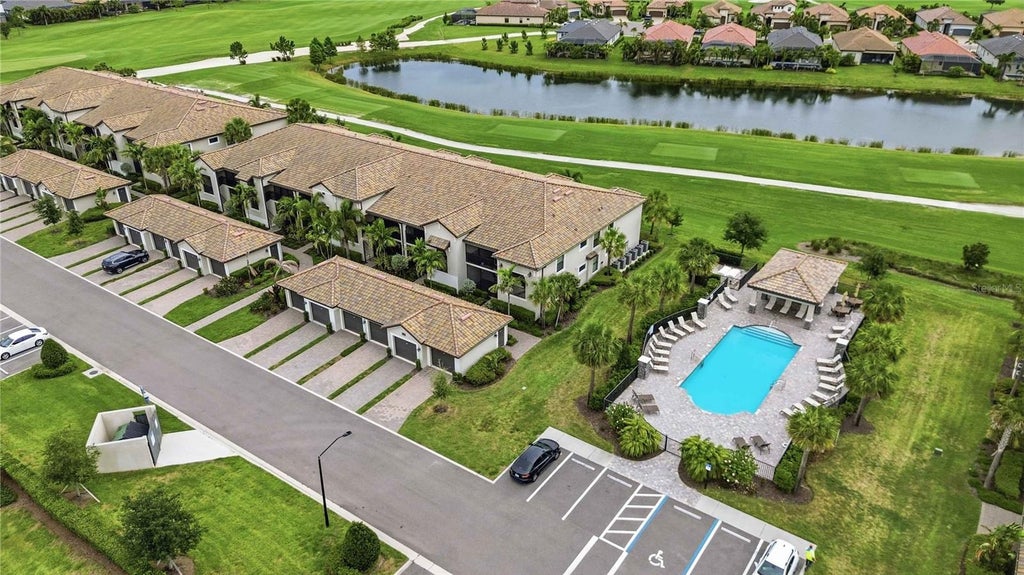 Photo of 5695 Palmer Circle #203, Bradenton, FL 34211 (MLS # A4696270)