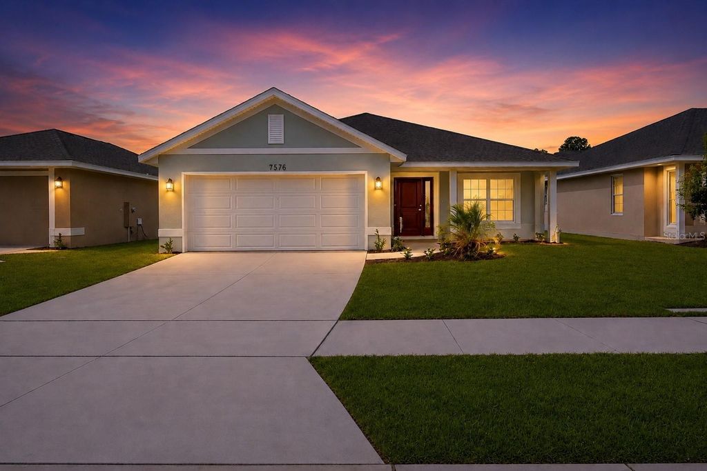 Photo of 1667 Ann Rose Way, Leesburg, FL 34748 (MLS # O6423156)