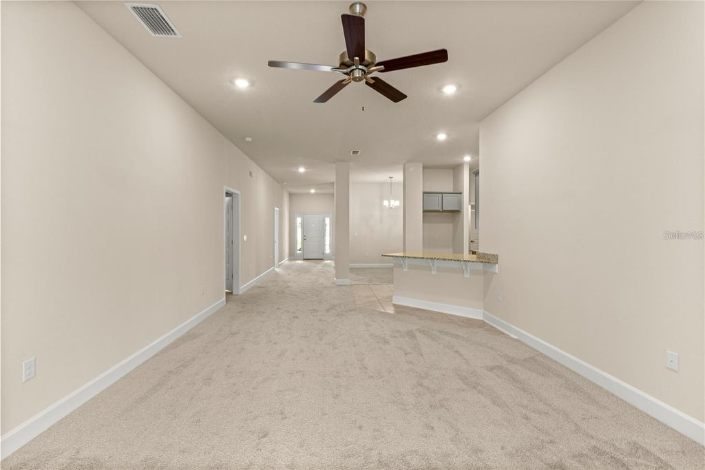 Photo of 1667 Ann Rose Way, Leesburg, FL 34748 (MLS # O6423156)