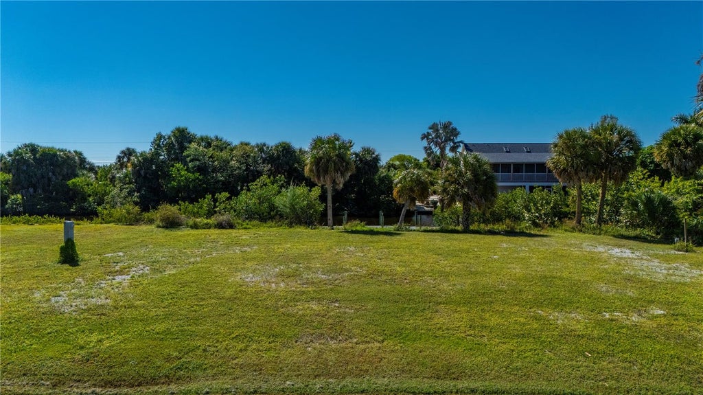 Photo of 24319 Blackbeard Boulevard, Punta Gorda, FL 33955 (MLS # C7532243)
