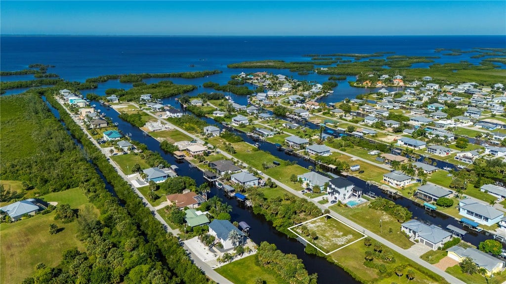 Photo of 24319 Blackbeard Boulevard, Punta Gorda, FL 33955 (MLS # C7532243)