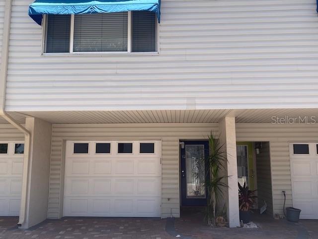 Waterfront townhome with boatslip. 2 bedroom 2 bath Wood flooring throughout. Hurricane windows. Pirates Cove has new wear decking on the community boardwalk, new kayak launch. Metal roof in progress. Bahama Shutters scheduled for installation August.