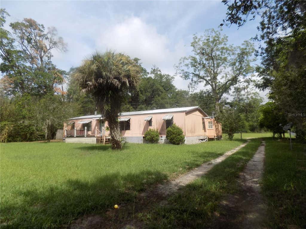Photo of 8708 NE Waldo Road, Gainesville, FL 32609 (MLS # GC540578)