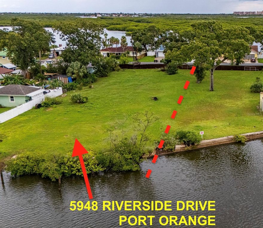 SUBJECT PROPERTY IS A .62 ACRE SECLUDED SINGLE FAMILY RESIDENTIAL WATER FRONT LOT LOCATED AT THE SOUTH END OF RIVERSIDE DRIVE IN PORT ORANGE RIGHT ON SCENIC ROSE BAY. THE LOT IS A 100 FT WIDE BY ~ AVG. OF 275 FT DEEP (~27,547 SF) WITH LARGE BEAUTIFUL OAKS, CONCRETE BOAT RAMP WITH ROOM TO BUILD A CUSTOM BOAT DOCK TO HOUSE & MOOR YOUR WATER CRAFT. THE  PARCEL PROVIDES ACCESS TO THE INTRACOASTAL WATERWAY VIA MILL CREEK PROVIDING AMPLE DRAFT. THIS PARCEL HAS PLENTY OF AREA TO BUILD YOUR CUSTOMIZED HOME ON THIS DEEP LOT TO ENJOY OUR FLORIDA SUNSETS OVER THE SOUTH END OF ROSE BAY.