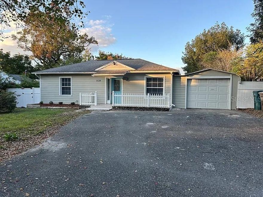 Lease and Lease-to-Own options available. This beautifully renovated 3-bedroom, 2-bath home in the City of Ocala offers modern upgrades, flexible space, and exceptional potential. Enjoy a bright, expansive sunroom, ample storage, and a thoughtfully updated interior featuring brand-new granite countertops, custom kitchen cabinetry, updated bathroom vanities, stylish light fixtures, stainless steel appliances, built-in oven and microwave, cooktop, dishwasher, large country-style sink, new electrical service, updated plumbing, new flooring, and washer/dryer hookups. The additional rear lot creates a rare opportunity with a spacious backyard-perfect for entertaining, gardening, or adding an accessory dwelling or secondary structure for future income potential. Buyer incentive available: receive a FREE 1% interest rate buy-down for the first year when using the preferred lender. A turnkey property with upgrades, space, and opportunity-this one is not to be missed.