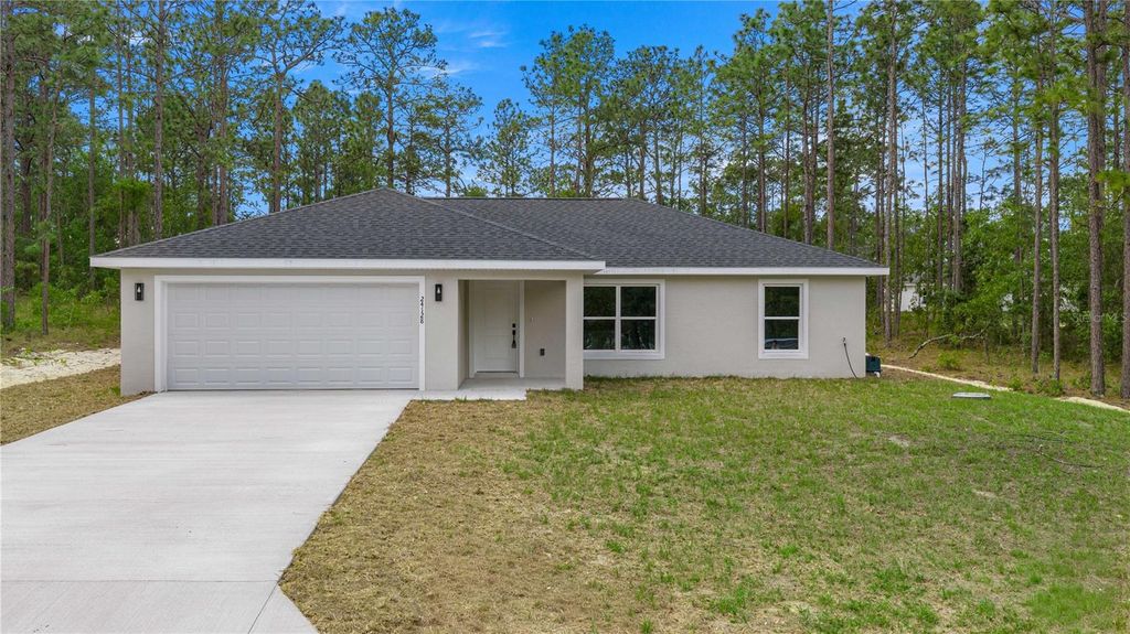 Photo of 24128 NW Geranium Avenue, Dunnellon, FL 34431 (MLS # OM724047)