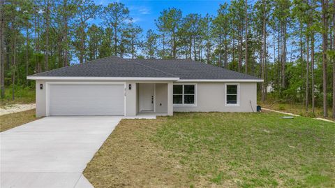 Photo of 24128 NW Geranium Avenue, Dunnellon, FL 34431 (MLS # OM724047)