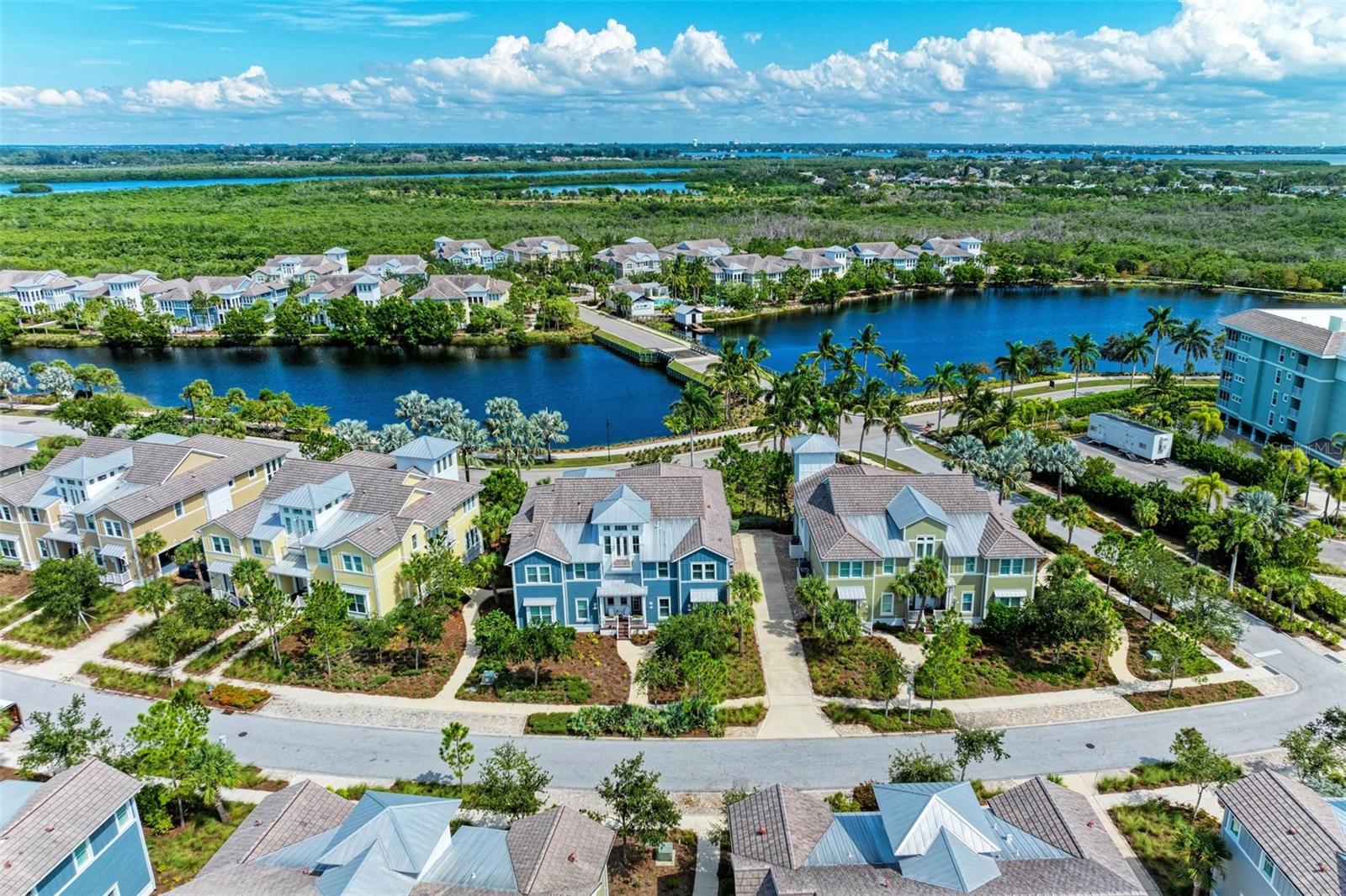 One or more photo(s) has been virtually staged. This is what you have been looking for! Amazing *LEASE* on highly sought-after Compass Point Drive Home in beautiful Harbour Isle! Now you can live like you're on vacation in this gated coastal resort community on Anna Maria Sound. In this luxury home you can begin your mornings with a cup of coffee in your sunroom as the sun is rising over the mangroves and sparkling Sapphire Lake. End your day catching peek-a-boo views of a stunning sunset over Anna Maria Sound from the front of the home or take a quick walk to the Harbour Isle Beach Club with panoramic views of the water reaching all the way to Tampa Bay. This immaculate home is light and bright and has so many recent upgrades that make it almost too good to be true. Recently added features include; hot water heater, kitchen faucet, shower heads, overheard garage storage, LG side by side refrigerator, HALO water filtration system, LG washer, dryer and dishwasher, ELITE Lennox air conditioning unit and so much more. Don`t miss this amazing, custom-built Bourbon bar that is second to none —amazing way to relax in your sunroom at the end of the day. Wood look plank tile flooring and tile is featured in every room. French doors, vaulted ceiling with beams, upgraded ceiling fans, tray ceilings, 5 1/4 inch baseboards throughout, crown molding in entry and living area, 8 ft. solid core doors and a private elevator that opens directly from your garage to your living space on the second floor. The spacious 42" white wood cabinets with soft close, stainless appliances - featuring a double oven with front controls, granite counters and large island with breakfast bar are featured in this beautiful kitchen. Walk into the serene, large primary bedroom with views of Sapphire Lake and a large walk-in closet. The Primary bath features dual vanities and oversized stand alone shower. The guest bedroom has an en-suite full bath, allowing privacy for your guests. The home also features a third spacious bedroom with custom closet and sliding door. The third full bath is large and conveniently located in the hallway and easily accessible from the main living area. An amazing custom sunroom, large living area and dining room are also included on the main level. The oversized 2-car garage has 12` ceilings with overhead storage. A custom loft is built into the garage for maximum storage. Amazing furniture in the beautiful home is negotiable.While inside the gates at Harbour Isle, explore two miles of neighborhood walking and bike trails and find an inviting hammock for an afternoon siesta. Stroll to one of the four nearby neighborhood pools with outdoor grills, cabanas, fire pit, lap pool and kayak launch for the 38-acre lake. End the day with an incredible sunset at the 23,000 square foot Beach Club overlooking Anna Maria Sound. The Beach Club features resort-style amenities with the Sky Bar, Lounge, Pavilion, Fitness Center, Yoga Lawn, Event Lawn, resort pool, hot tub and a private beach to launch a kayak in the Sound. Just outside the gates of Harbour Isle, you`ll find the Jimmy Buffett Margaritaville-inspired Compass Hotel, Safe Harbour Marina with wet and dry storage, and Floridays waterfront tiki restaurant. Cross the Manatee Bridge and you`re on Anna Maria Island with its sugar sand beaches and island charm. It`s time to start living your best life. Live, relax, enjoy an active lifestyle and/or work from home in award-winning Harbour Isle. LEASE NOW!