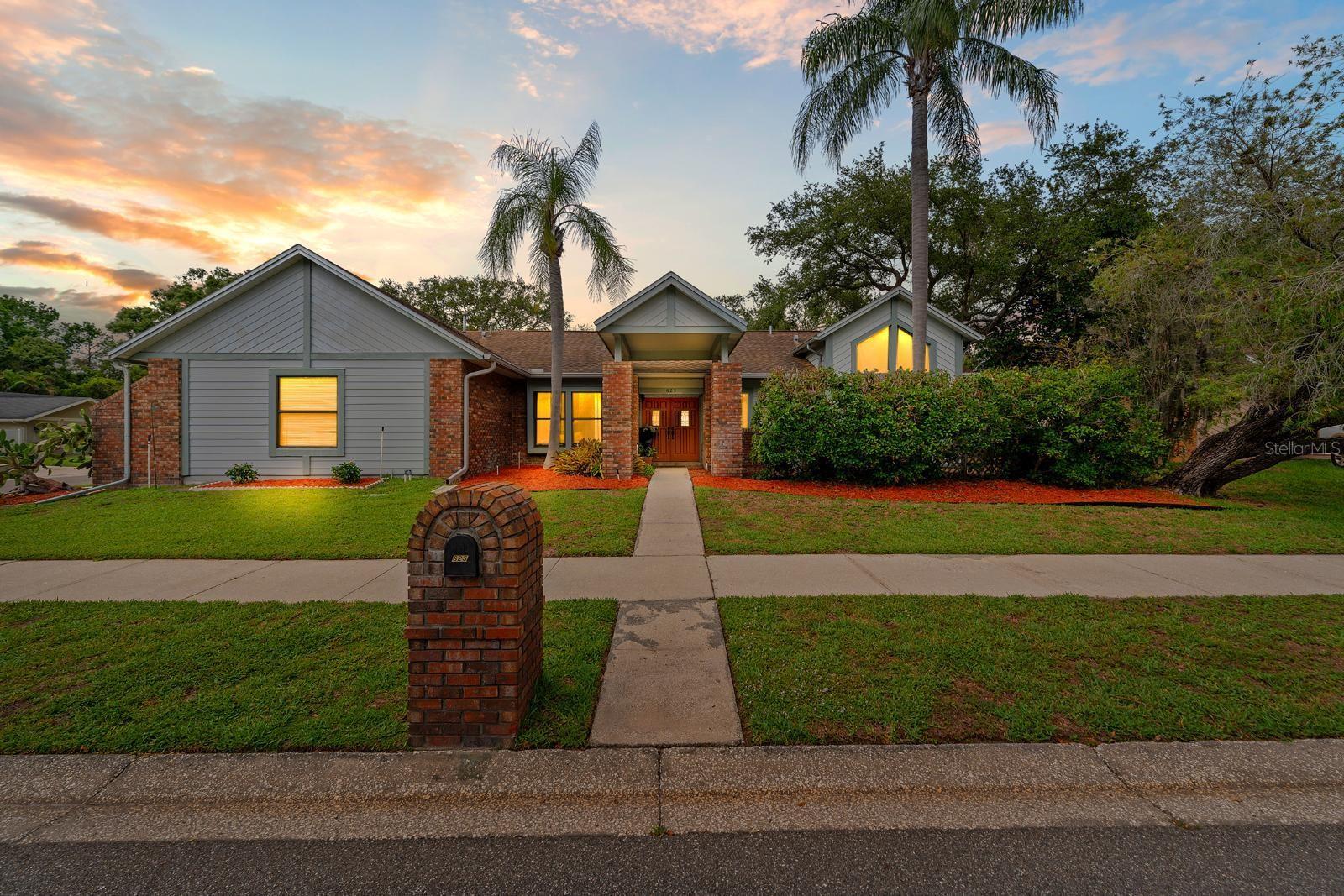 Back on the market! Previous buyer’s financing fell through in final underwriting. Appraisal & inspections completed. This beautifully maintained home is ready for a quick closing! Don’t miss your second chance! Situated on a quiet horseshoe-shaped loop in the heart of highly desirable Safety Harbor, Florida, this spacious pool home offers 4,010 total square feet of well designed living space, including a 3,110 square foot main residence and a private one bedroom one bath attached suite with its own entrance. The screened in lanai features a resurfaced in ground swimming pool, visible from nearly every main living area and ideal for both relaxation and entertaining. The main home includes four bedrooms, three full bathrooms, a dedicated office, a large laundry room, and an open concept great room that combines the living and dining spaces with a wet bar for added convenience. The kitchen offers a breakfast bar and a sunlit dining nook with direct views of the pool and outdoor living area. The attached suite provides excellent flexibility and includes its own living room, full kitchen, walk in closet, bathroom, and private pool views, making it a great option for rental income or a comfortable space for visiting friends and family. Additional features include a two car garage, a 2023 water heater, and a roof with more than ten years of life remaining according to a recent inspection. Located in Safety Harbor’s final evacuation zone, the home has a history of minimal storm impact, offering added peace of mind. With easy access to Philippe Park, top rated schools, a vibrant community center, and Safety Harbor’s award winning downtown filled with local shops, restaurants, and popular events, this home presents a rare combination of space, versatility, and location in one of Tampa Bay’s most beloved communities.