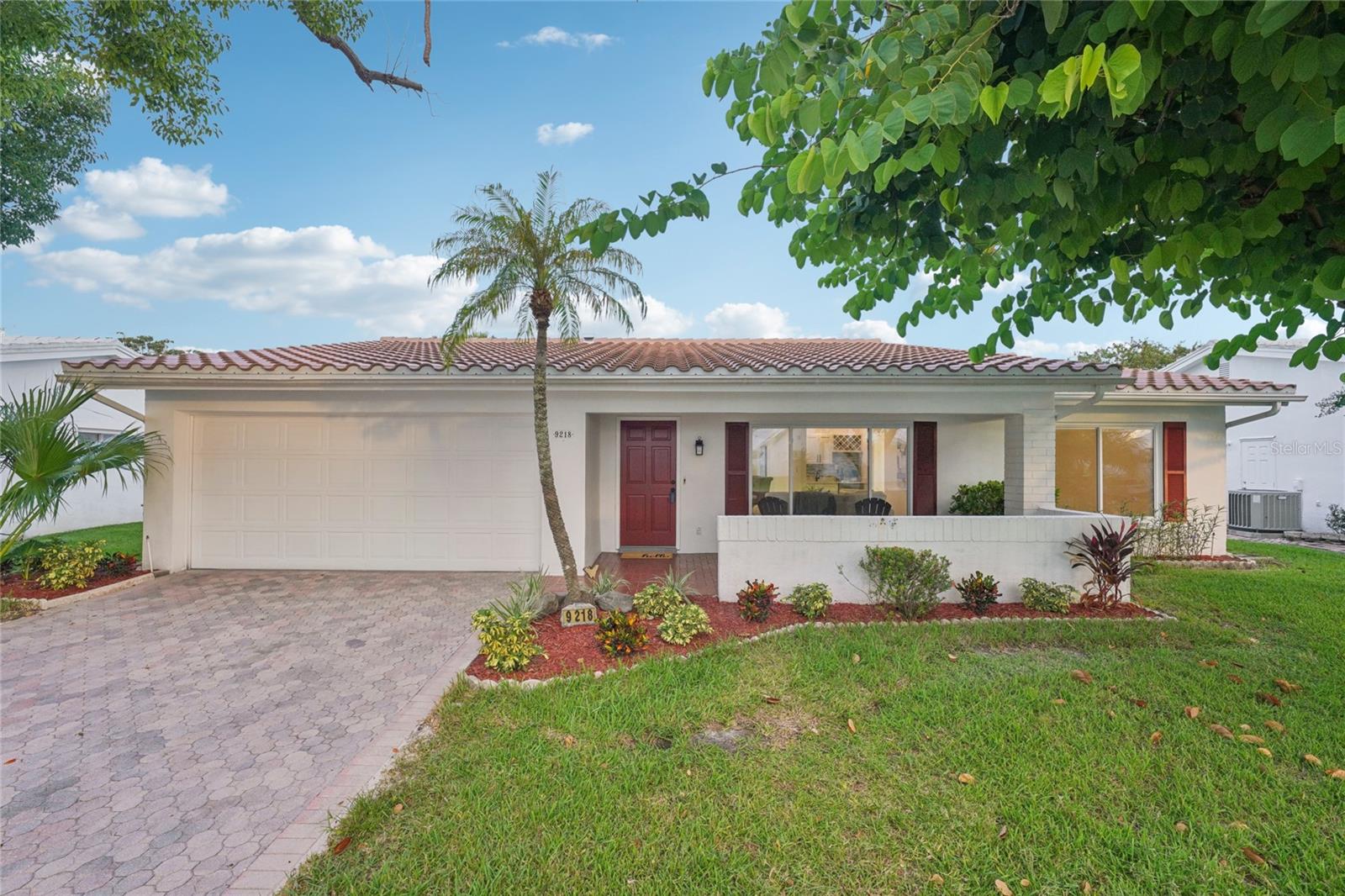 Discover the perfect blend of comfort and modern living in this Beautifully Updated Home, ideally situated with a spacious front patio and a stylish brick paver driveway. This remarkable residence boasts a brand-new tile roof and HVAC system, along with newer energy-efficient low-e double pane windows, a new water heater, and an upgraded electric panel. The kitchen is a culinary delight, featuring stunning granite countertops, a chic subway tile backsplash, soft-close shaker cabinetry, contemporary drawer pulls, and sleek stainless-steel appliances, complemented by a custom vent hood and recessed LED lighting. You will love the expansive breakfast bar and conveniently located laundry area with additional storage to enhance functionality. The open floor plan is perfect for entertaining, showcasing a custom wet bar adorned with a glass tile backsplash, a wine rack, and a refrigerator, along with a cozy Florida room that features a wood-burning fireplace. Additional highlights include a thoughtfully designed layout that incorporates a third bedroom, which can serve as a home office, craft room, or gym, accentuated by a modern barn door. The home is adorned with neutral décor, knockdown textured finishes, freshly painted walls and ceilings, recessed LED lighting, updated 5 1/2-inch baseboards, new interior doors, and contemporary hardware in a sleek black finish. Luxury vinyl and tile flooring flow seamlessly throughout the space. The private master suite offers a walk-in closet and an ensuite bath featuring a walk-in shower, an updated vanity with a granite countertop, and custom tile work. An additional bathroom, also updated with a granite countertop, custom tile, a low-flow toilet, and LED lighting, is sure to impress guests. The large garage features epoxy-finished flooring, adding to the home's appeal. For golf enthusiasts, the Mainland's Golf Course is conveniently located in the neighborhood, while a nearby pool and clubhouse provide easy access to leisure activities. The home is also close to Bill Jackson’s Shop for Adventure, Aldi’s, and Freedom Lake Park, which offers a dog park with separate areas for large and small dogs, fitness stations, fishing spots, grilling areas, picnic tables, pavilions, a brand-new playground, a walking track, and the Korean War Memorial, making it an ideal location for outdoor enthusiasts. Easy Access to Gulf Beaches, Sam’s Club, Coffee Shops, Fitness Centers, shopping, dining, Helen Howarth Park, Equestrian Trail, Dog Park and Forbes recreation area, I-275, St. Pete/Clearwater and Tampa International Airports. Come see all of the features this beautiful home and active community have to offer; it won't last long!