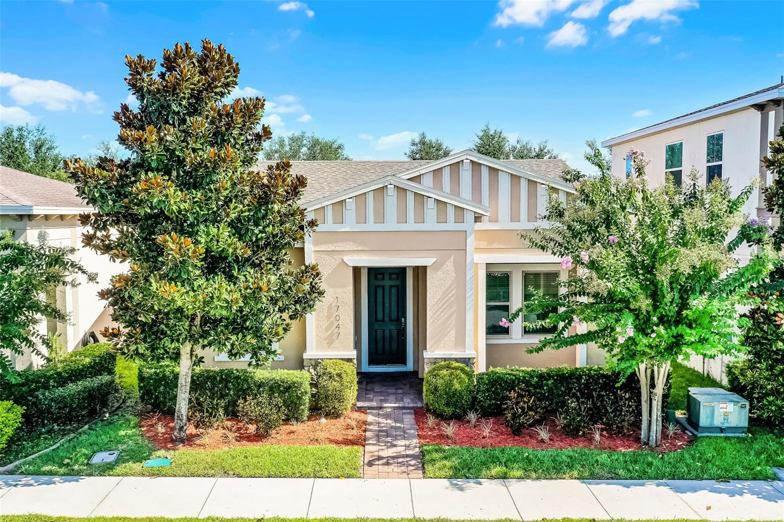 Welcome to 17047 Harbor Oak Parkway in the highly sought-after Waterside Community of Winter Garden! This 3-bedroom, 2-bath residence is a true gem, offering an unparalleled combination of comfort, style, and convenience. Step inside and be greeted by tall ceilings and an open floorplan perfect for entertaining with tons of natural light. Towards the front of the home, you'll find the primary bedroom with two large walk in closets and oversized en suite bathroom, with two guest bedrooms just across the hall. One of the many highlights of this property is its prime location. Imagine enjoying lazy afternoons by the community pool or staying active at the adjacent recreation center, both conveniently located just across the street. The park and playground adjacent to the property provide additional opportunities for outdoor recreation and family fun. Don't miss the opportunity to make this haven in the Waterside Community your own. Schedule a showing today and discover the perfect blend of luxury, convenience, and community living in Winter Garden!
