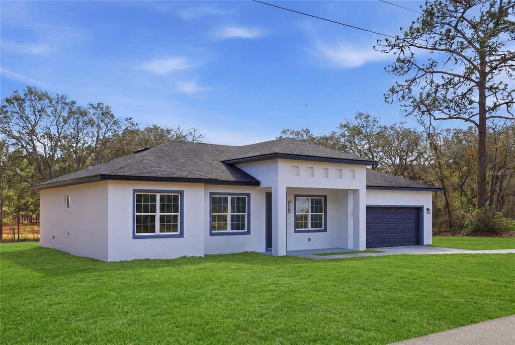 Photo of 13206 SW 65th Circle, Ocala, FL 34473 (MLS # O6437001)
