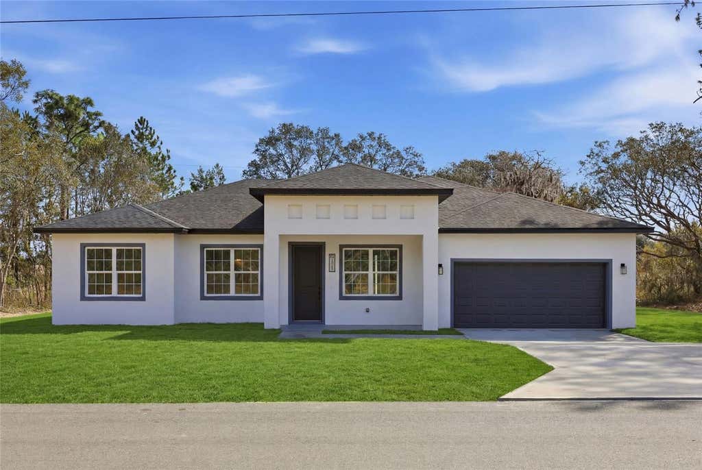 Photo of 13206 SW 65th Circle, Ocala, FL 34473 (MLS # O6437001)