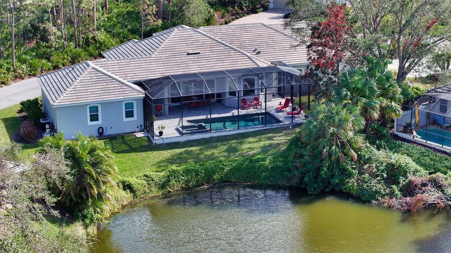 A rare opportunity to own a significantly newer, custom-built residence inside the exclusive The Oaks Club Preserve, where most surrounding homes were built decades earlier. Completed in 2017 and set on a lakefront lot in a non-flood zone, this move-in-ready, hurricane-secure home offers a level of modern construction, privacy, and peace of mind seldom found in this exclusive community. In addition, the home boasts a rare oversized 3 car garage plus attic with ample plywood floor storage and central vacuum. Wake up to shimmering water views with your morning coffee, open the 16-foot panoramic sliders, and let pleasant breezes flow through, as indoor and outdoor living blend seamlessly. Spend your days relaxing by the heated saltwater pool and spa, cooking in the outdoor kitchen, or hosting sunset gatherings overlooking the water in complete privacy.
Inside, the home offers an easy, intuitive flow designed for comfort and simplicity. Soaring 12' ceilings, abundant natural light, and wide sightlines connect the living, dining, and gourmet kitchen spaces. They are not only easy to maintain but perfect for small and large family celebrations and entertainment. A walk-in pantry, lakefront view breakfast nook, and elegant finishes add both beauty and practicality to daily life, and the home provides abundant storage throughout, making it effortless to stay organized and clutter-free.
With four bedrooms plus an office and three Carrera-marble-tile bathrooms, the home blends luxury with thoughtful function. Built to today’s strict hurricane standards with full impact windows and storm-secure structural features, it provides exceptional resilience and peace of mind on the Gulf Coast. 
The Oaks Club Preserve offers 24/7 guarded security and maintenance-free living, along with membership to The Oaks Club, featuring two championship golf courses, 12 Har-Tru tennis courts, pickleball, croquet, a fitness center, community pool, and multiple dining venues. For golfers, every day can begin with early tee times, scenic fairways, and a welcoming social calendar just minutes from home.
Close to the #1-rated school in Florida, Pine View, the Legacy Trail, and world-famous Siesta Key Beach, this home delivers modern construction, luxury amenities, and a resort-like lifestyle in one of Sarasota’s premier country clubs. Own a piece of paradise and schedule your private tour today.