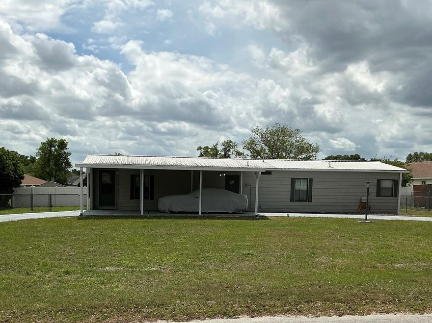 Beginners Special, Awesome opportunity to own a 2 bedroom 2 bath mobile home located in Sun Country Estates off of Hwy 200.  Needs a little TLC to make it your home.  The circler drive makes getting in and out easy with the carport for the vehicle to stay out of the Florida sun.  The back lanai is screened in opening into the fenced backyard great to keep everyone and fur babies safe.  This will not last long Call us now for your personal showing.  See you soon!