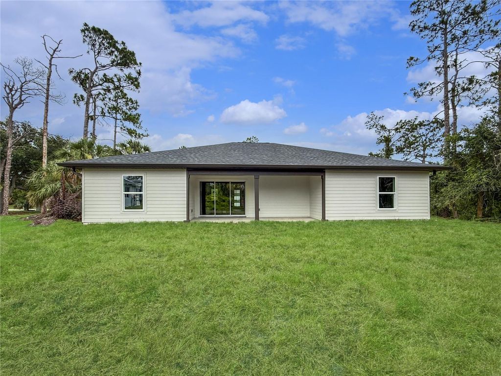 Photo of 73 Barstow Street, Port Charlotte, FL 33954 (MLS # C7512278)