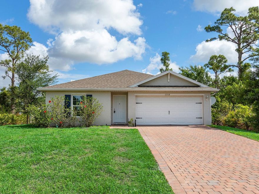 Built in 2020 and located in the X flood zone according to current FEMA mapping, this 4-bedroom home offers peace of mind and modern features. With a 2-car garage, a private fenced yard, and 1,485 square feet of living space, the layout feels open, bright, and comfortable. The kitchen features beautiful quartz countertops and stainless steel appliances, while a spacious walk-in closet in the primary bedroom and plenty of storage throughout provide excellent storage. Tile flooring runs throughout the main living areas for easy maintenance, while the bedrooms feature luxury vinyl flooring that adds quality and style. Hurricane shutters offer added protection and convenience during hurricane season, and the newer construction means less worry and more time to simply enjoy your home. Conveniently located near shopping, dining, beaches, and everyday essentials, this home is ready for its next owner to move right in and make it their own.