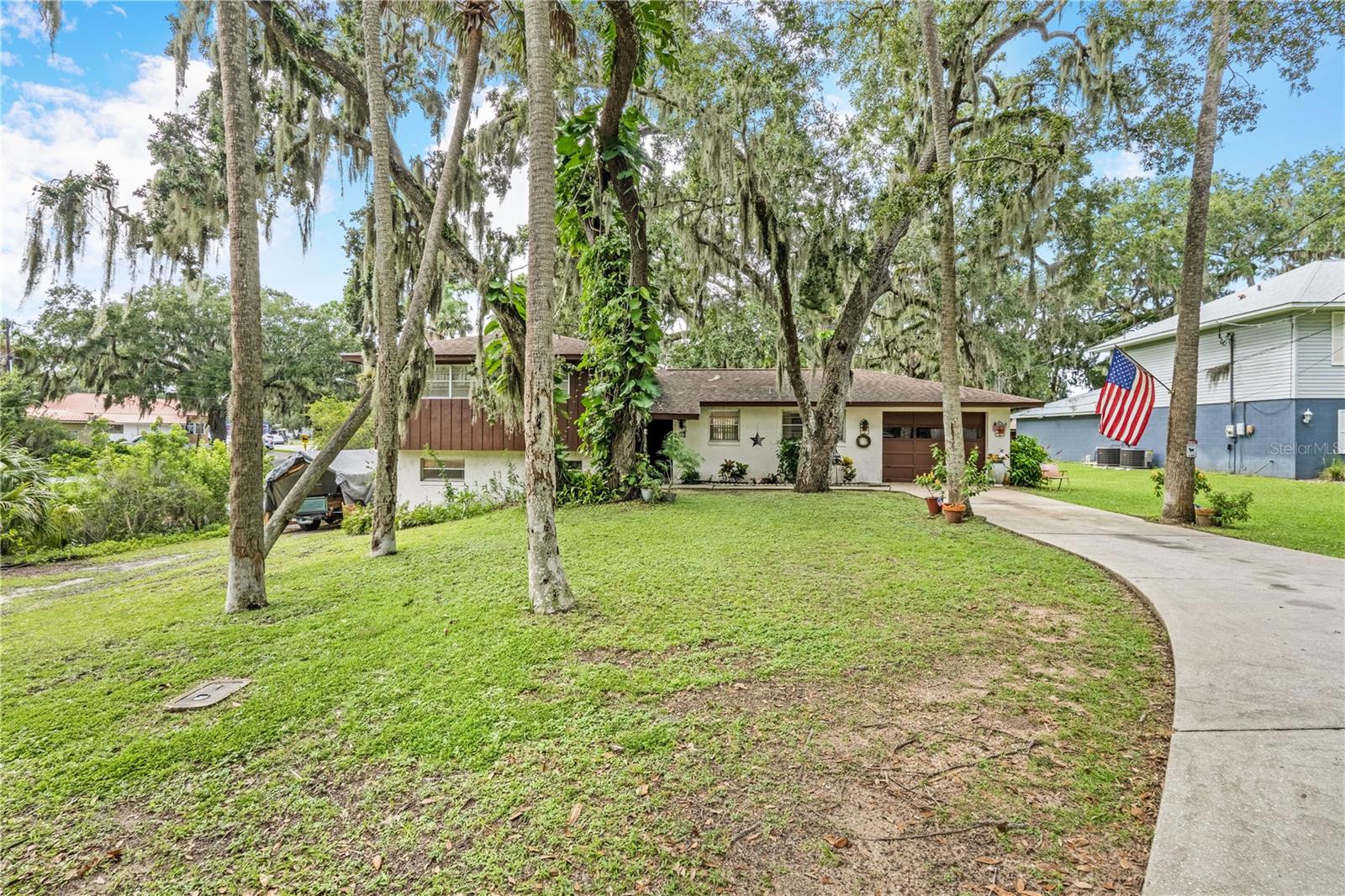 Waterfront Retreat with Private Dock in Port Orange
Welcome to 24 Oak Street, a rare multi-level waterfront home offering timeless charm and a canal that offers direct access to the Intracoastal Waterway. Built in 1973 and lovingly maintained by its original owner, this 3-bedroom, 2.5-bath residence boasts 1,570 sq. ft. of living space on an expansive .42-acre lot with approximately 150+ feet of seawall. Step inside to find a warm and inviting layout featuring a spacious living area with a cozy fireplace, perfect for gathering with family and friends. The elevated, multi-level design creates both character and functional separation of space, while windows bathe the home in natural light and highlight tranquil canal views. Outdoor living takes center stage with a 24x6 dock and additional boat slip, ensuring direct access to the 30-foot-wide canal leading straight to the Intracoastal, an ideal setup for fishing and water enthusiasts. The generous lot size and mature surroundings offer both privacy and room to expand your outdoor living dream. This property presents a unique opportunity to own a piece of Florida waterfront history. With its solid bones, prime location, and one-owner legacy, it’s ready to be enjoyed as-is or re imagined into your modern coastal retreat.