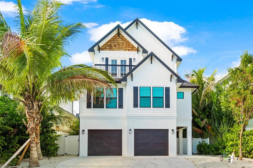 This exceptional newer-built coastal retreat on Lido Key featuring eight bedrooms and nine and a half bathrooms, each thoughtfully crafted for comfort, style, and relaxation. The home showcases a bright, modern coastal aesthetic with shiplap detailing, wood-paneled ceilings, and designer lighting throughout. The expansive great room flows seamlessly into the dining and kitchen areas, creating an inviting atmosphere for gatherings of all sizes. The gourmet kitchen is a standout feature with quartz countertops, high-end appliances, open shelving, custom cabinetry, and a large island perfect for casual seating and entertaining. Every bedroom includes its own en-suite bathroom, providing privacy and convenience for guests, while the dedicated bunk room offers a charming and functional space for younger visitors. The interior also features an elevator for easy access across all levels. Entertainment is effortless with a game area that includes indoor activities such as shuffleboard and sports arcade games, along with multiple lounge spaces for relaxing or socializing. A rooftop deck adds yet another desirable element, offering wide-open views ideal for enjoying sunsets, morning coffee, or evening cocktails. The outdoor living experience is truly resort-style, highlighted by a heated pool with a curved waterslide, shallow sun shelves, tropical landscaping, and generous covered lounge areas that allow guests to enjoy the Florida climate in comfort, whether in the sun or shade. Ample seating, outdoor dining areas, and a spacious patio make this home perfect for poolside enjoyment and hosting memorable gatherings. Living on Lido Key means embracing a lifestyle defined by sugar-white beaches, clear blue water, and access to one of the most charming coastal communities on the Gulf Coast. The home is located just minutes from St. Armands Circle, known for its upscale dining, boutique shopping, and vibrant social scene. Outdoor recreation is abundant, with opportunities for boating, paddleboarding, kayaking, and exploring nearby nature trails. The island offers the perfect balance of relaxation, recreation, and sophistication.
In addition to its beauty and amenities, this home is also a proven high-performing vacation rental, attracting steady demand from guests seeking space, luxury, and convenience. Its generous layout, resort-style features, and prime location make it a top choice for large groups and returning visitors, providing an exceptional investment opportunity on one of Florida’s most desirable barrier islands.