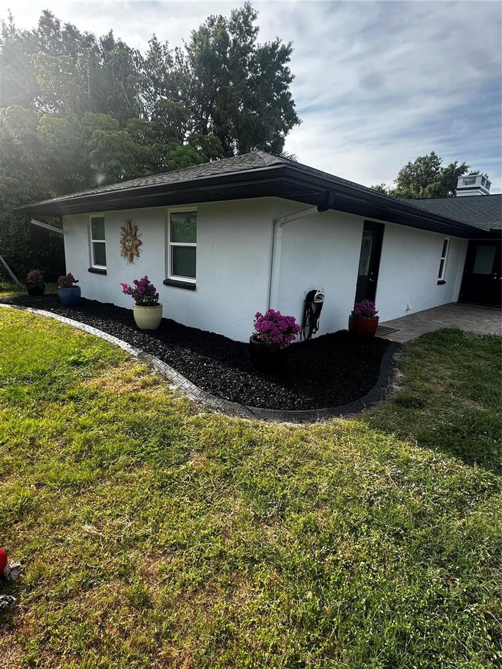 Photo of 37951 Washington Loop Road, Punta Gorda, FL 33982 (MLS # O6310693)
