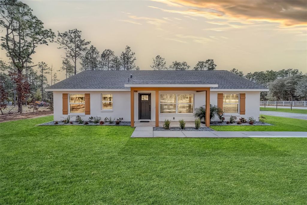 Photo of 6655 SW 135th Terrace Road, Ocala, FL 34481 (MLS # OM716591)