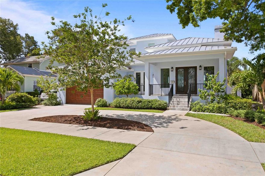 The epitome of coastal living this Snell Isle home, built in 2020 with heated saltwater, pool and spa, metal roof and split bedroom plan, is block construction and built more than 10ft above sea level. All the bedrooms are en-suite and have walk-in closets. The master bedroom is upstairs, but there is a 2nd large guest-suite on the first floor that can be a 2nd master-bedroom. The home is light and bright with French doors to the front and back covered lanai‘s, the private pool courtyard- and the additional fenced-in, large grassy backyard area for play. Great-room open concept is designed for the kitchen, butlers pantry, dining and family room area that opens to the courtyard pool & spa and to the back yard plus covered rear lanai
Multifunctional with many layout options the home is a "must see". The more formal living area includes the gorgeous living room
with library style shelving, 14 foot ceilings, and wood burning fireplace and is adjacent to the den/study (or 5th bedroom option). 
All  flooring on the 1st floor is porcelain tile, and the 2nd floor is engineered wood. The 2nd floor includes an open loft area for lounging and entertaining, the master bedroom & two other large bedrooms. The large master suite  has its own terrace overlooking the pool, and a luxury master bathroom with soaking tub and shower.
The layout  of the home and outdoor areas, is wonderful for entertaining and well suited for multigenerational needs.  One block from the waterfront and within minutes of downtown St Pete. More details to follow.