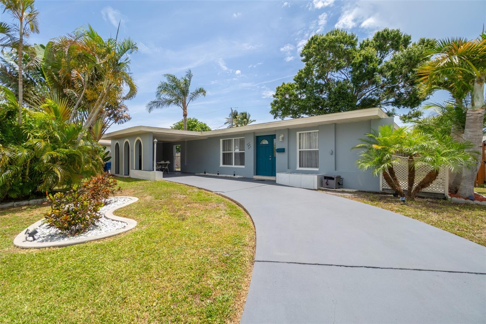 This beautiful 3-bedroom, 2-bathroom home has been completely renovated. Features include a newer roof, fresh paint throughout, new laminate and tile flooring, updated kitchen with new cabinets, countertops, and stainless appliances, plus new bathroom vanity. The master bedroom has French doors and walk-in closet. Additional highlights include eat-in kitchen, private fenced yard with patio, attached carport, storage shed, and central air/heat. Connected to city water and sewer, this move-in ready home is close to shopping, dining, and recreational opportunities with easy access to the Indian River Lagoon and Intracoastal Waterway - perfect for fishing and watersports!