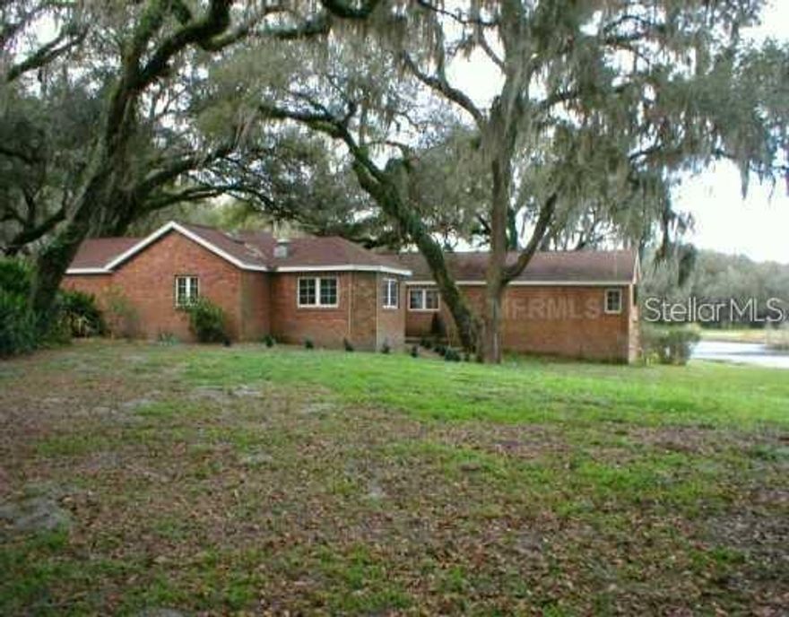 3br/2ba custom built brick home on a beautiful half-acre lot.