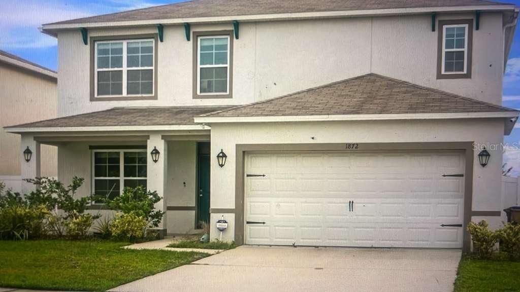 Photo of 1872 Rustic Falls Drive, Kissimmee, FL 34744 (MLS # O6396042)