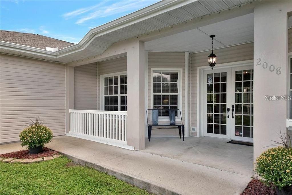 Photo of 2008 Proude Street, Port Charlotte, FL 33953 (MLS # O6355406)