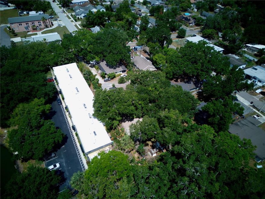 Step inside this home from anywhere! To experience a fully immersive walk-through of this home click on the Video or Virtual Tour button on this page.  Exceptional investment opportunity in the heart of Downtown Orlando! Situated on just over half an acre in the highly desirable SODO/Downtown Orlando corridor, 2119 S Fern Creek Ave offers incredible income-producing potential with 10 total units across three separate buildings. Whether you are looking to expand your real estate portfolio, pursue a value-add opportunity, house hack by living in one unit while generating rental income from the others, or explore future redevelopment possibilities, this versatile multi-family property delivers endless potential. Currently occupied with nine long-term tenants in place, the property generates over $92,000 in gross annual income, providing immediate cash flow for investors. The main building features four units, while the second and third buildings offer six efficiency units combined, creating a flexible and diversified rental setup. The property is enhanced by mature landscaping, charming curb appeal, abundant on-site parking, additional storage and shed space, and even a unique tree house tucked away in the rear of the property. Residents enjoy comfortable living spaces in a prime central location just minutes from Downtown Orlando, Orlando Health, shopping, dining, entertainment, major highways, parks, and everything the vibrant downtown lifestyle has to offer. Opportunities like this are rare — ideal for investors seeking strong rental income, multi-generational living, redevelopment potential, or long-term appreciation in one of Orlando’s most sought-after growth areas.