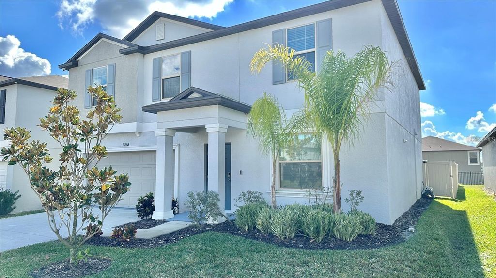 Photo of 31363 Sun Kettle Loop, Wesley Chapel, FL 33545 (MLS # TB8439183)