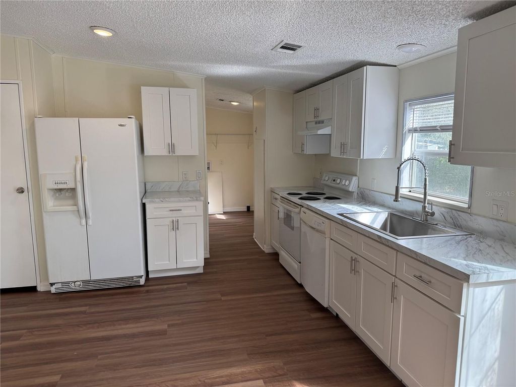 Photo of 300 Hankin Road, Alturas, FL 33820 (MLS # B4902189)