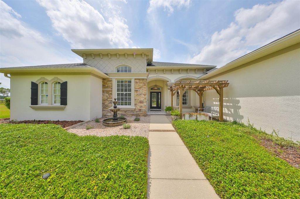 Photo of 18423 Lithia Towne Road, Lithia, FL 33547 (MLS # TB8377757)