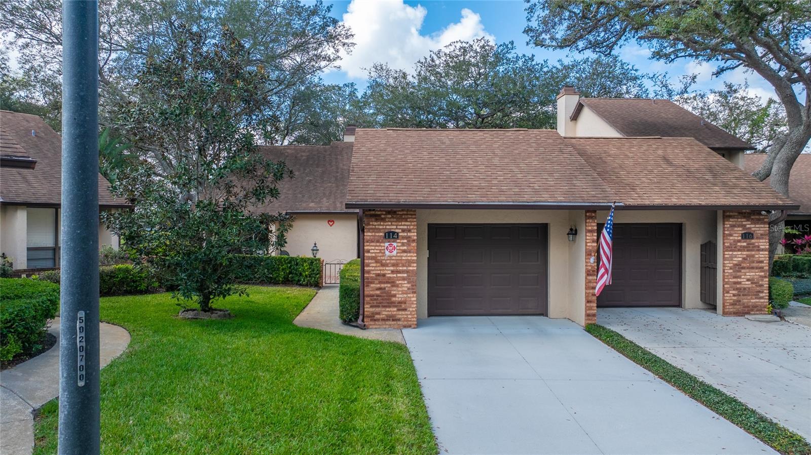 Welcome to your new oasis overlooking the 10th FAIRWAY on the GOLF COURSE in WEKIVA COUNTRY CLUB. What a SPECTACULAR VIEW!! **Single Story*-End Unit*-2 Bedroom*-2 Full Baths*-1 Car Garage** This townhome-style condominium offers privacy and MAINTENANCE-FREE living. ( HOA covers the exterior maintenance , incl. Roof, Exterior Paint, Pressure Cleaning, Driveways, Landscaping, Irrigation, Pest-Control, Termite Bond, Basic Cable, Pool & so much more). You'll feel right at home entering the welcoming brick paver front porch. Open the solid-wood entrance door into the living areas with vaulted ceilings, brick fireplace, open concept living/dining-room. Beautiful views from every room. .Skylights & wall to wall sliding glass doors in the living room opening to the FL/Sunroom and the peaceful backyard overlooking the Golf Course. Your FL/Sunroom (160 sq ft.) offers Noise-Reducing Double Pane sliding glass windows. This large Up Dated kitchen offers plenty of counter/Corian and storage space with an eat-in kitchen. The sizeable primary bedroom offers an ensuite bath, walk in closet, views of the Golf Course, and private access to the FL/Sunroom. Your ensuite bathroom has a separate vanity with double sinks, large private shower and water closet to the left. then the nice size walk-in closet is located off to the right of the vanity. The other generous-sized bedroom is facing the front of the home with a beautiful view of the patio. The front patio is surrounded by brick half-wall, the perfect place for your furry-family members to relax while you can keep a watchful eye on them. The front patio also offers updated drip system and pavers. This beautiful home offers many more updates: New AC 2023, New Double Pane Windows,Window Treatments, New Flooring ( Vinyl Plank) New Washer, New Water Heater, New Pipes in 2021-2022. Don't forget about the central vacuum, trash compactor in the kitchen and water filtration system throughout the whole house. You or your whole family will love to live in Wekiva, with over 145 acres of common areas, incl. 7 parks, miles of walking & biking trails, Lakes, Tennis, Basketball, Baseball, Library and so much more. This lovely villa is close to shopping, hospitals, restaurants, I4 & major highways are just minutes away. LOCATION is key!! Top-rated Seminole County Schools. Don't miss out, call today!!!
