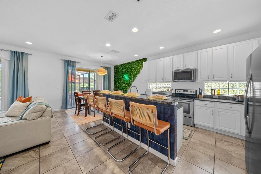 Photo of 4164 Oaktree Drive, Davenport, FL 33837 (MLS # O6371809)