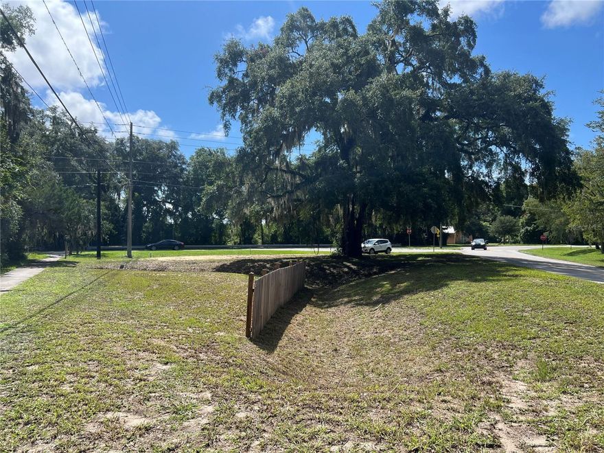 Located on the Corner of SE 15th Street and SE 22nd Avenue, this prime property is at the se entrance to the Gainesville City Limits. It is across from the proposed new development next to McPherson Park. "Back yard" is the prestine Buddist Gardens. Gorgeous oak tree sits on the property.
