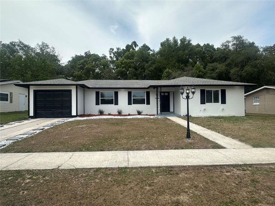 Welcome to this stunningly remodeled, turnkey home in Citrus Springs where modern elegance meets incredible versatility! Every inch of this property has been thoughtfully updated with fresh paint, beautiful new flooring, and a gorgeous, fully modernized kitchen. While public records indicate a 2-bedroom layout, this home features a fantastic, spacious bonus room that perfectly serves as a third bedroom, home office, or guest suite, alongside the wonderful convenience of two completely upgraded full bathrooms. With its pristine finishes, open feel, and a prime location near local springs and trails with no HOA, this move-in-ready gem offers exceptional value and comfort for its next lucky owner.