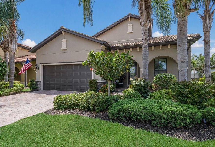 THIS HOME IS A WOW! SHOWS LIKE A MODEL AND IS IN IMMACULATE MOVE IN CONDITION! BEAUTIFUL FRONT HOME ELEVATION WITH LUSH PROFESSIONAL LANDSCAPING. A BRICK PAVER WALKWAY, OVERHEAD ARCHWAY AND LEADED GLASS FRONT DOOR MAKE FOR A VERY IMPRESSIVE ENTRANCE TO THIS LOVELY HOME. SPECIAL FEATURES INCLUDE LUXURY ENGINEERED HARDWOOD FLOORS, TRAY CEILING ACCENTS IN THE DEN, DINING ROOM, AND PRIMARY BEDROOM. FABULOUS CHEF KITCHEN HAS STONE COUNTERTOPS WITH TILE BACKSPLASH, WHITE WOOD CABINETS, STAINLESS APPLIANCES, LARGE CUSTOM KITCHEN ISLAND WITH BREAKFAST BAR. SEPARATE DINING ROOM. LARGE PRIMARY BEDROOM WITH HUGE WALK IN CLOSET WITH A BUILT IN DRESSER, THE PRIMARY BATHROOM SPORTS A LARGE WALK IN SHOWER. FABULOUS GREAT ROOM HAS A SPECTACULAR BUILT IN FEATURE WITH A CONTEMPORARY ELECTRIC FIREPLACE, SPECIAL LIGHTING ABOVE ACCENTS WHITE STONE TILE, AND BUILT-IN SHELVING. THERE IS ALSO AN OFFICE NICHE WITH A BUILT IN DESK. THE LANAI HAS BEEN EXTENDED, HAS SUN SHADES AND BRICK PAVER FLOORING. OFF THE LANAI ENJOY A LARGE BRICK PAVER PATIO! EXTRA LARGE GARAGE FOR 2 CARS PLUS A LARGE STORAGE AREA, ROOM FOR A GOLF CART AND YOUR OTHER TOYS. HAMMOCK PRESERVE IS A BEAUTIFUL GATED COMMUNITY WITH A RESORT LIFESTYLE. AMENITIES INCLUDE A LARGE CLUBHOUSE, WITH FITNESS CENTER, RESORT POOL, TENNIS AND PICKLEBALL COURTS, DOG PARK TOO! ATTACHED TO THIS LISTING IS AN IMPRESSIVE LIST OF BUYER UPGRADES ON THIS SPECIAL HOME.