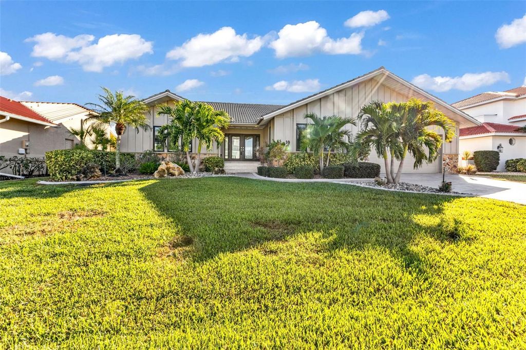 Photo of 10 Tropicana Drive, Punta Gorda, FL 33950 (MLS # C7517647)