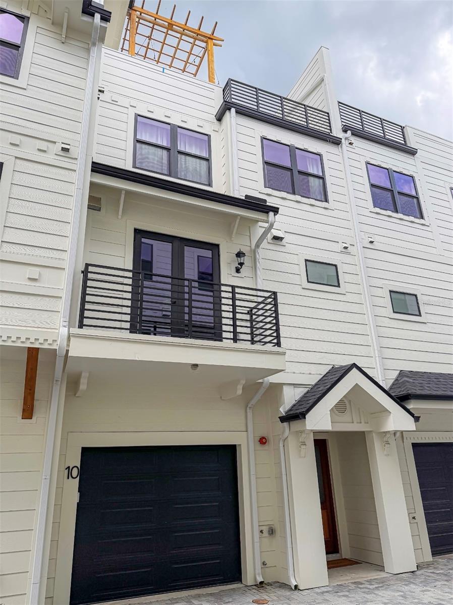 Experience this stunning luxury custom built townhome featuring four spacious floors, 4 bedrooms, and 3.5 baths. Fully furnished with exquisite touches throughout, it offers a gourmet kitchen perfect for hosting friends and family. Enjoy breathtaking views from your beautiful rooftop terrace — the perfect spot to relax or entertain in style.
Ideal for new Tampa residents who's unsure of what area to purchase in but want to explore the best of Tampa's city life, you’ll be close to popular restaurants, cozy afternoon hangouts, downtown Tampa, Amalie Arena, and much more. Enjoy style, comfort, and convenience all in one perfect place. Don't miss this opportunity!
