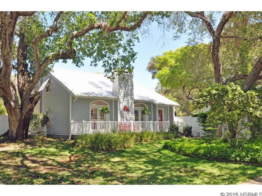 Charming beachside home situated on cul-de-sac corner.  Extremely private & immaculately maintained.  Tile & wood flooring & double-paned windows throughout.  Kitchen overlooks large screened porch & private yard & has gas stove, quartz counters & bar seating.  Livingroom has French windows overlooking front porch, skylights, cathedral ceilings built-ins & wood-burning fireplace.  Each bdrm has private bath.  Two of the bdrms have built-in Murphy beds.  Enter private 15x22 courtyard with hot tub from Florida Room.  Second level balcony.   Paver driveway & paths. Hardie board siding.  Considerable recent updating including new roof 2016, HVAC 2015.   Hook-up in place for either gas or electric dryer.   Coquina shell fireplace can be converted to gas. Remote control fans.  Hurricane shutters.   Great location just a few short blocks to car-free beach & grocery. ;Water: City