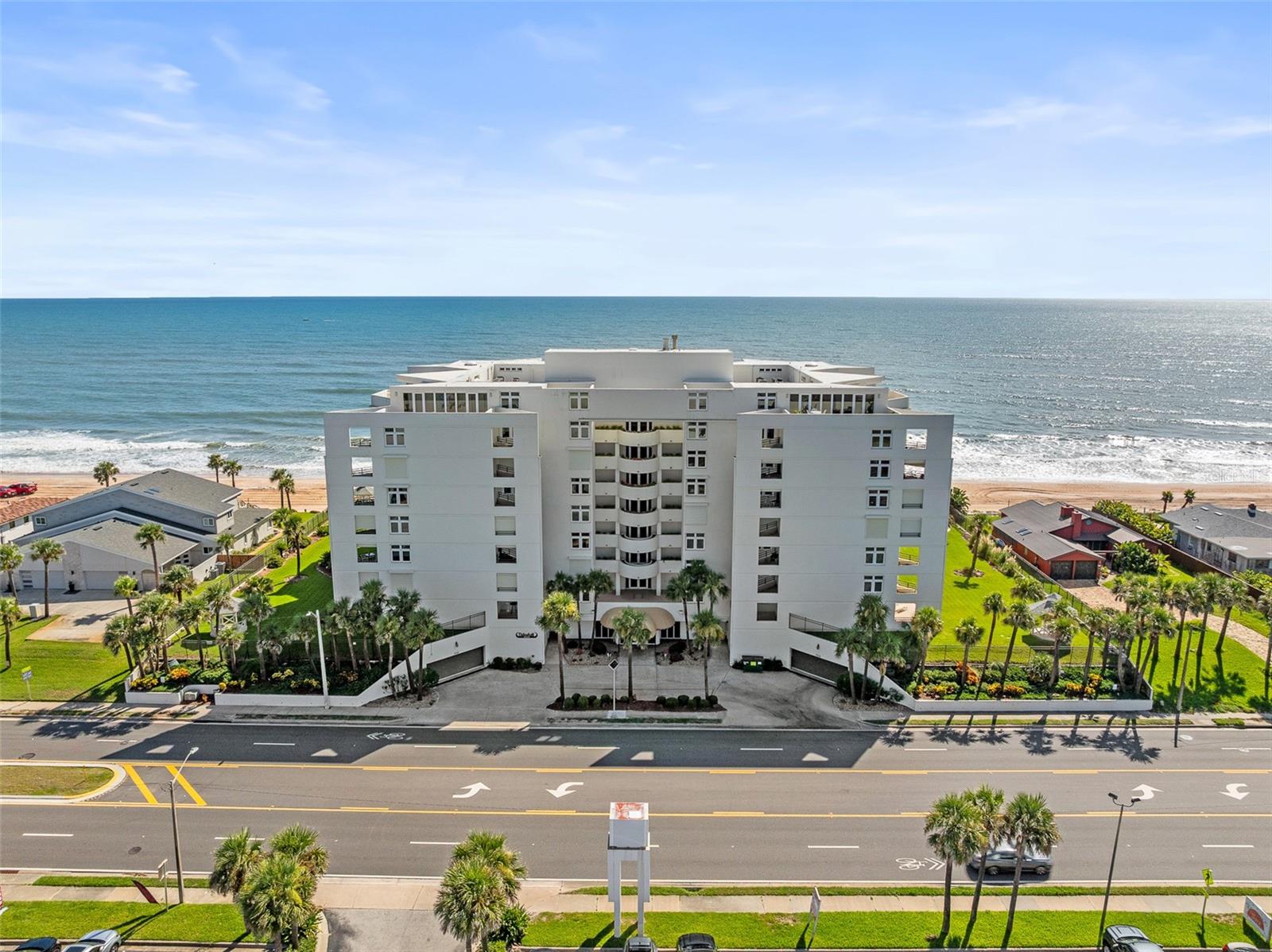 LIVE WHERE OTHERS VACATION – DIRECT ATLANTIC OCEAN ACCESS! Step right out your back door and onto the beach from this stunning 2BR/2BA luxury retreat at the coveted Tidesfall Condominium. With recent SIRS and Milestone reports in place, you can enjoy worry-free ownership from day one. Spanning nearly 1,600 sq ft of elegant under-air living space, this residence combines rare size with the very best of coastal living. Enjoy breathtaking southeastern exposure with year-round sunrises, moonrises, and even rocket launches from the comfort of your private patio, pool deck, or oceanfront gazebos. The expansive square patio offers a front-row seat to the sights and sounds of the Atlantic, creating the perfect spot to relax or entertain. Inside, the open-concept design flows seamlessly from the open and bright kitchen to the dining and great room where floor-to-ceiling windows showcase endless ocean views. The split floor plan features two spacious master suites, each with its own beautifully tiled walk-in shower, offering ultimate privacy for you and your guests. Additional highlights include impact-rated windows and doors, in-unit laundry, dedicated under-building parking, storage cubbies, and a bike/storage cage Tidesfall’s resort-style amenities elevate your lifestyle with a sparkling pool, oceanfront gazebos, a club room, and more. HOA fees cover staff salaries, cable, internet, water, trash, reserves, insurance, and amenities—making your oceanfront living as effortless as it is luxurious. This is more than a condo—it’s a lifestyle upgrade. Experience the beauty, tranquility, and exclusivity of Tidesfall, one of the most sought-after oceanfront communities. *Furnishings may be sold separately*