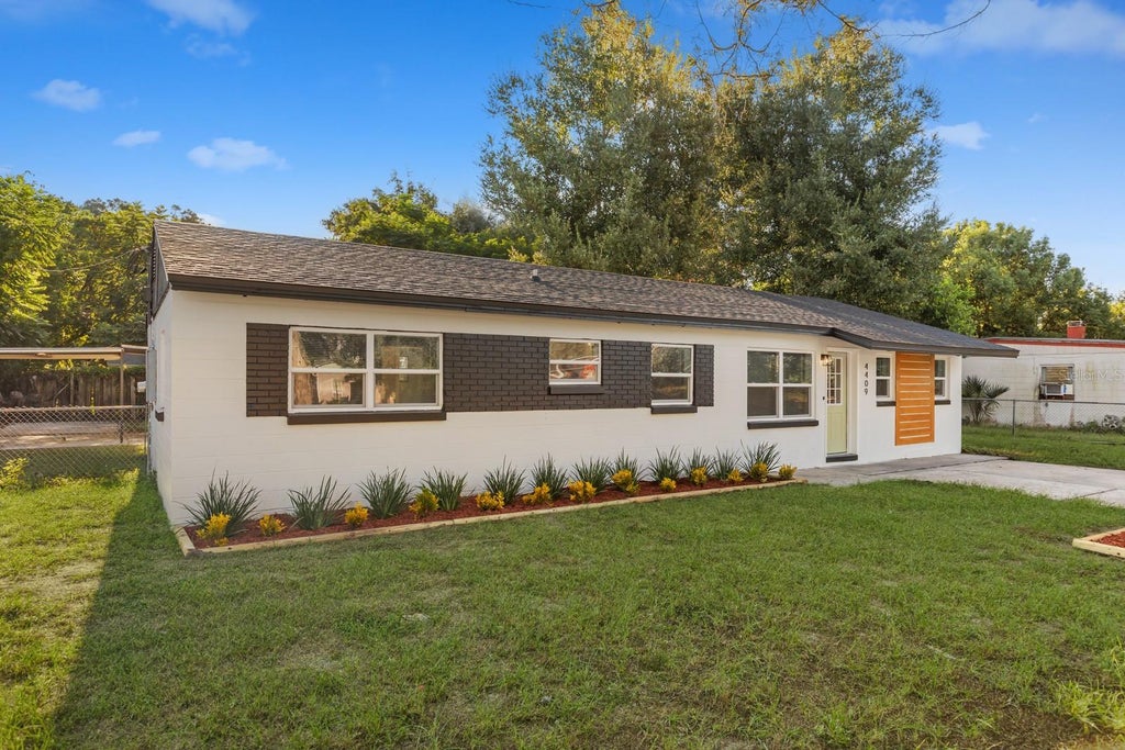 Photo of 4409 Debord Avenue, Orlando, FL 32808 (MLS # O6439837)