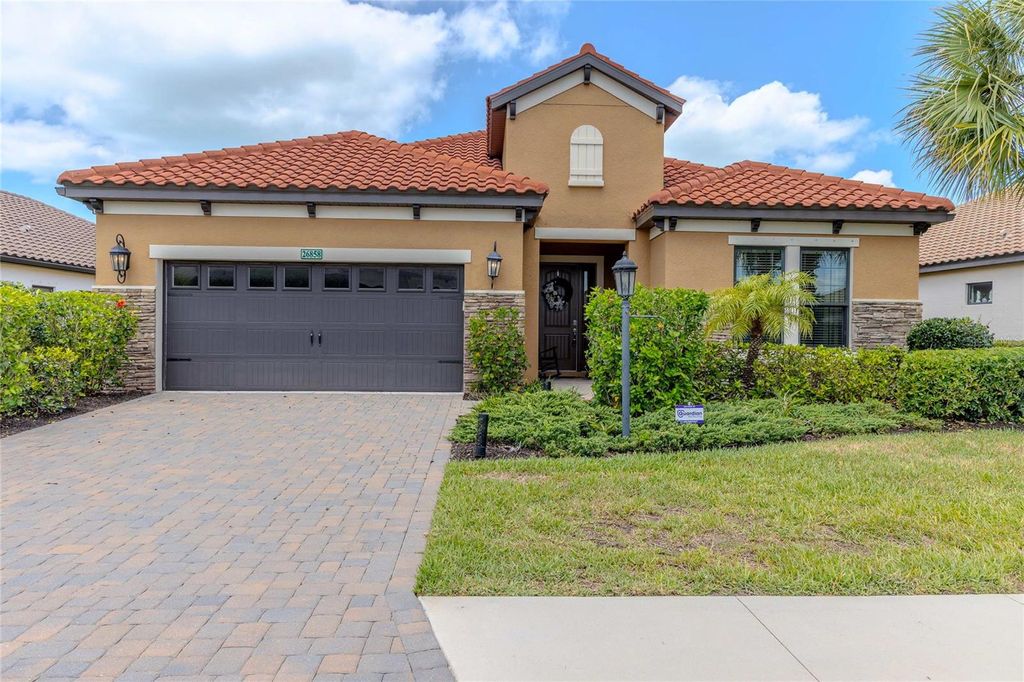 Photo of 26858 Weiskopf Drive, Englewood, FL 34223 (MLS # A4693152)